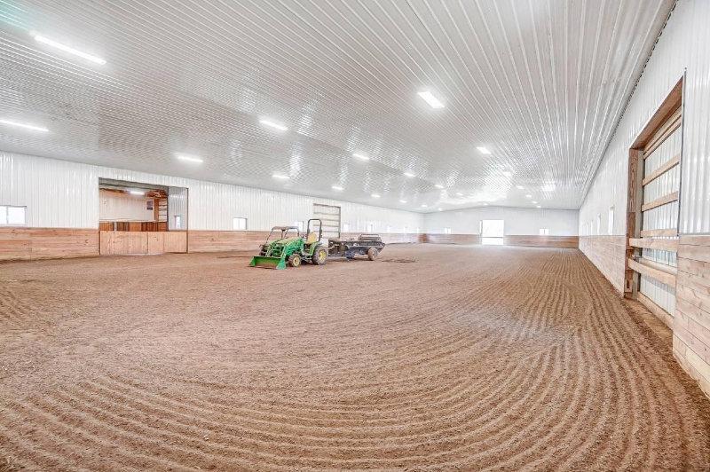 BEAUTIFUL ESTATE AND HORSE FARM ON 29+ ACRES | Stunning custom-built Granville home on 29 acres with horse farm.