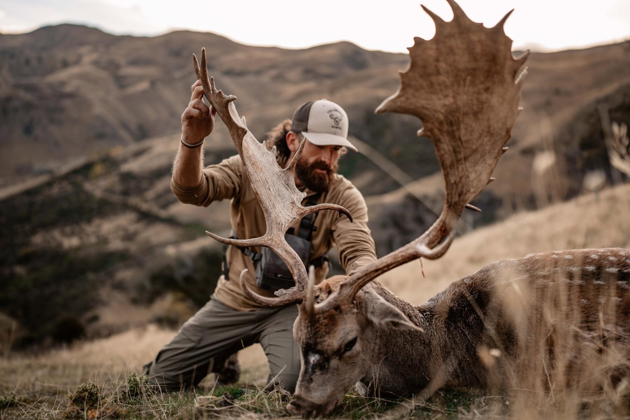 a colossal Fallow Buck to cap off his epic Red Stag hunt.