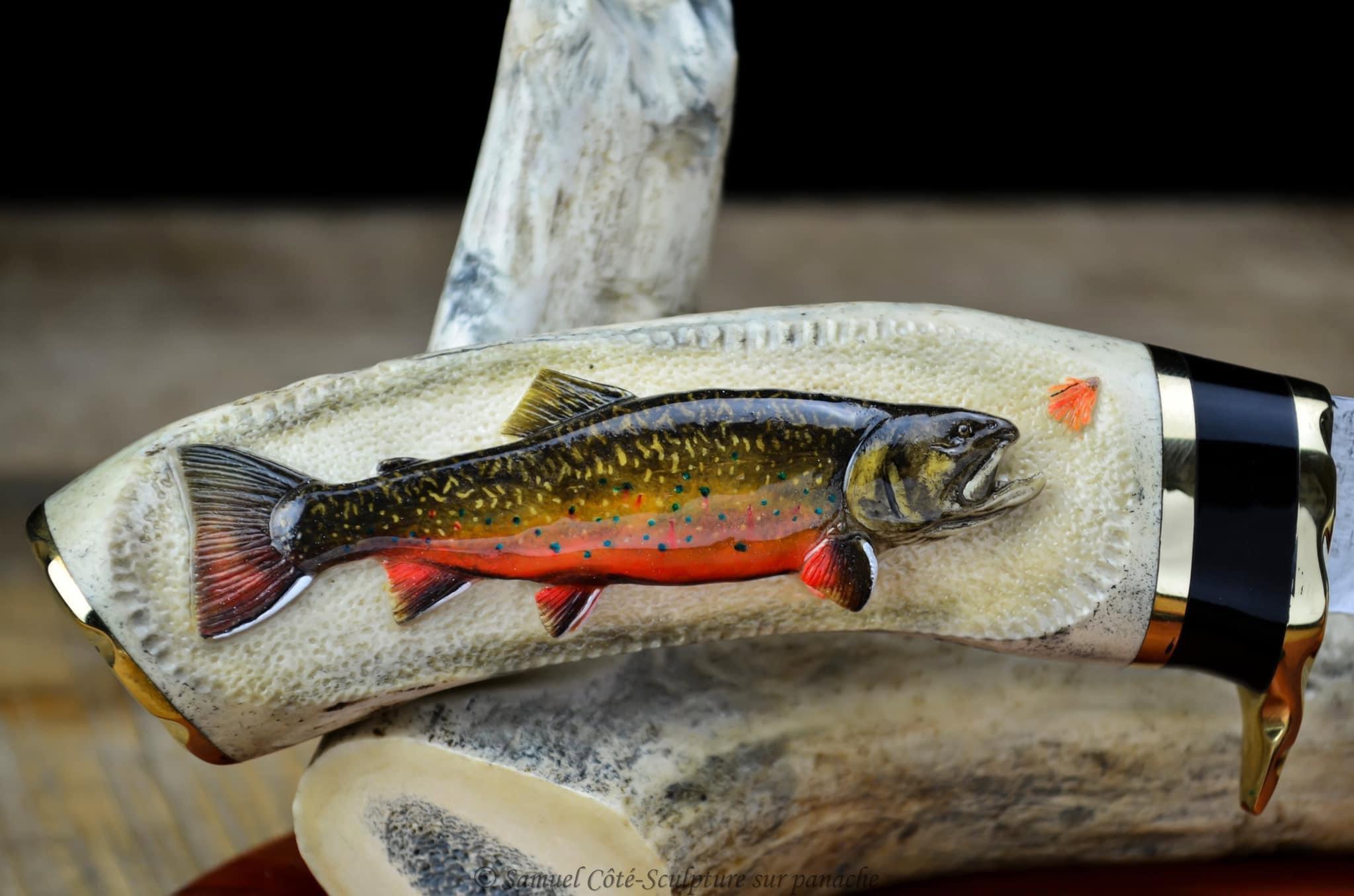 Just finished this piece with a brook trout carved on the antler made of moose antler.