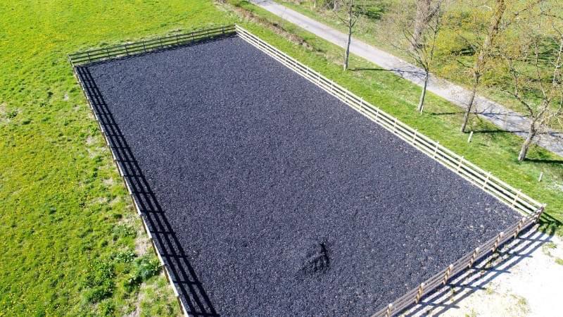 Renovated farm with horse stable and riding arena.