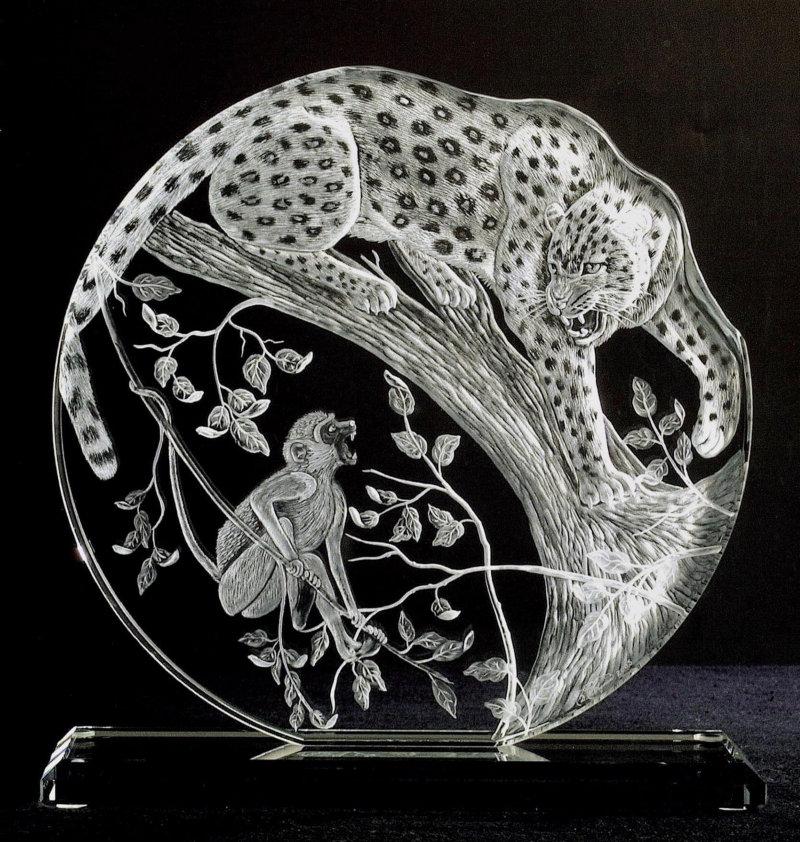 7 inch circle I engraved front and back and also shaped along the edge with leopard and vervet monkey -all freehand engraved