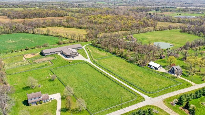 BEAUTIFUL ESTATE AND HORSE FARM ON 29+ ACRES | Stunning custom-built Granville home on 29 acres with horse farm.