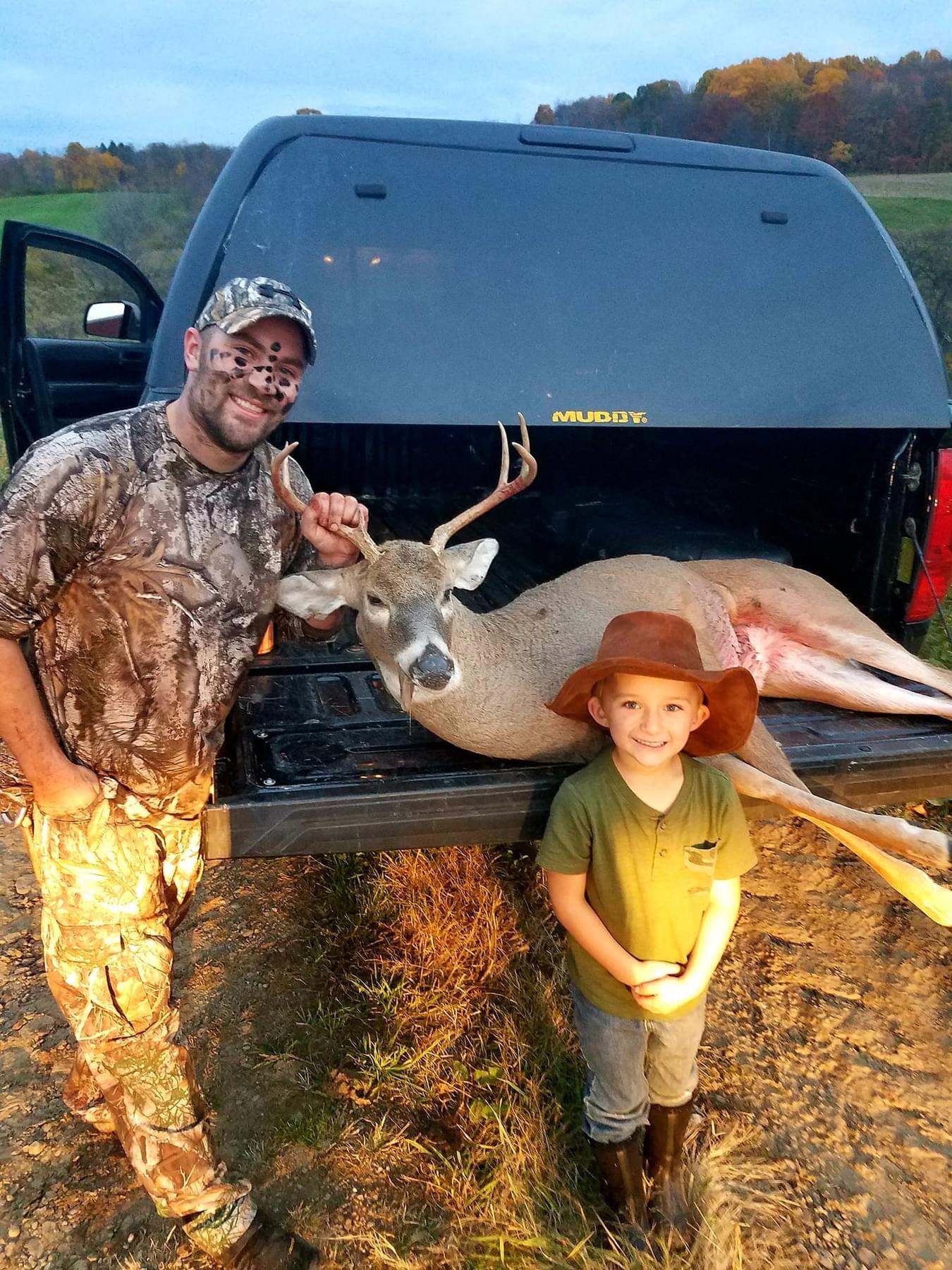 First archery buck, and giving my son the education you cant get from school!