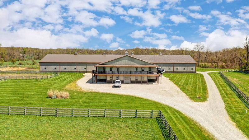 BEAUTIFUL ESTATE AND HORSE FARM ON 29+ ACRES | Stunning custom-built Granville home on 29 acres with horse farm.