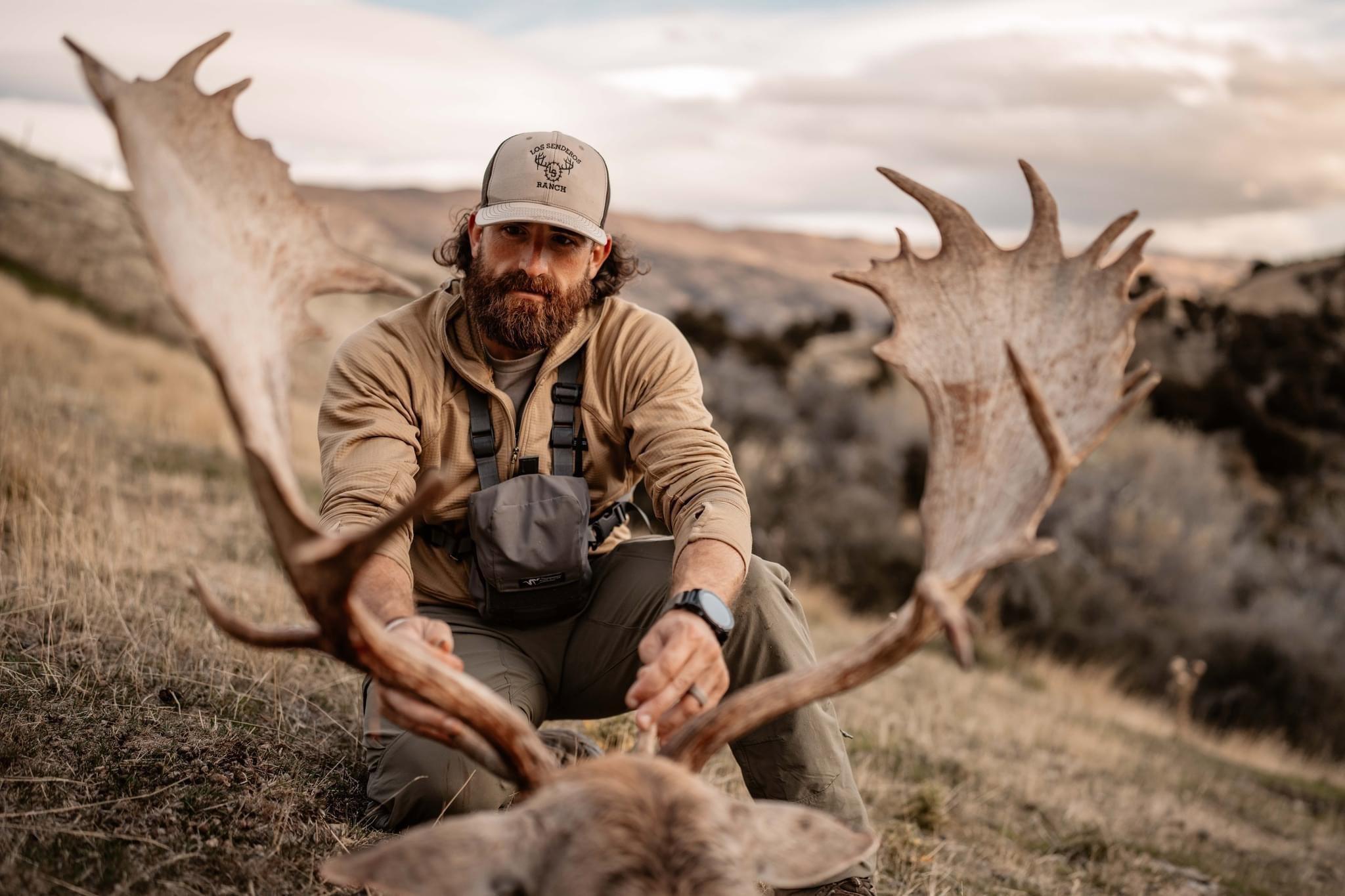 a colossal Fallow Buck to cap off his epic Red Stag hunt.