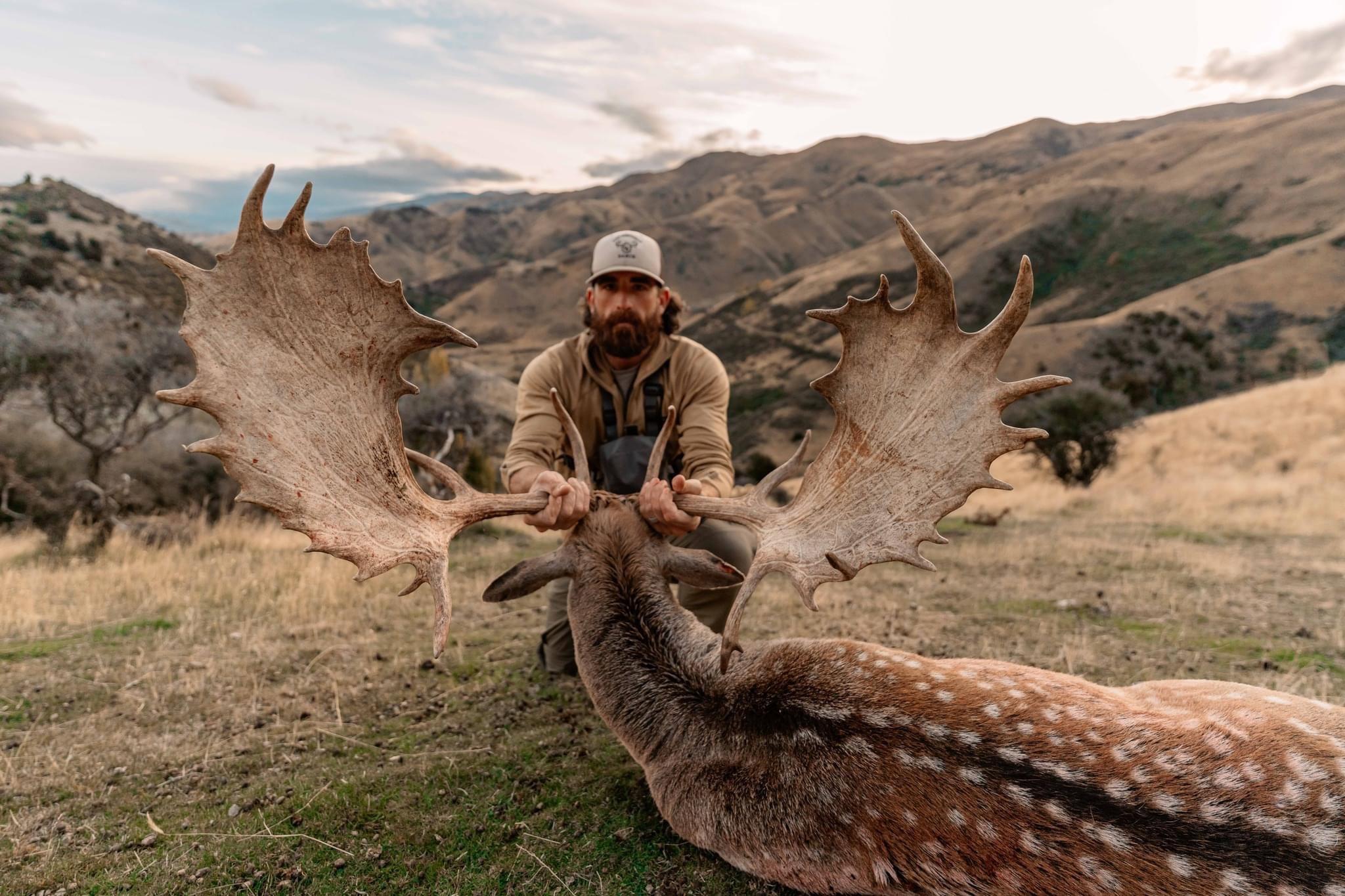 a colossal Fallow Buck to cap off his epic Red Stag hunt.